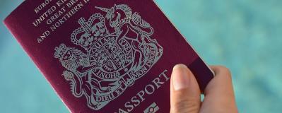 British passport in ladies hand