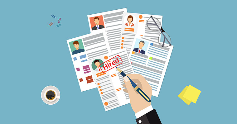 CV on desk with a hired stamp