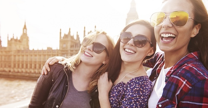 Happy young friends in London
