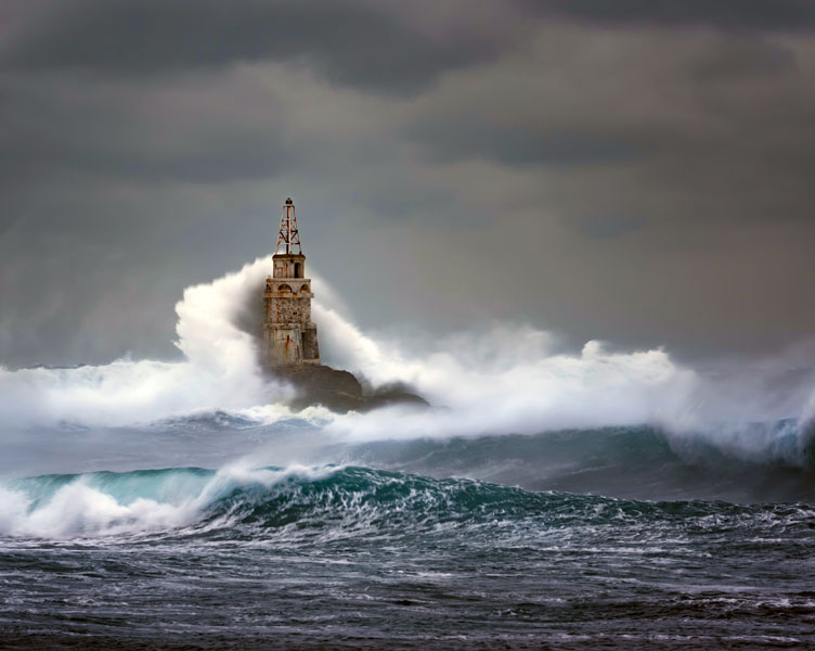 Light house stormy weather ocean night
