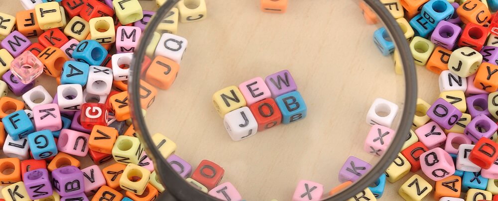 New job spelled out on beads 