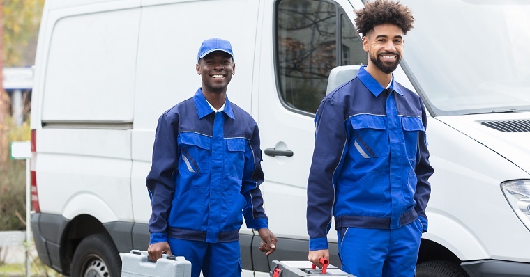 Skilled workmen smiling