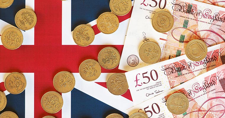 Pounds and coins Pounds and coins lying on flag