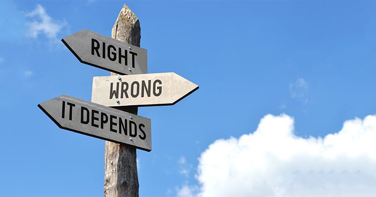 Sign pointing to right or wrong