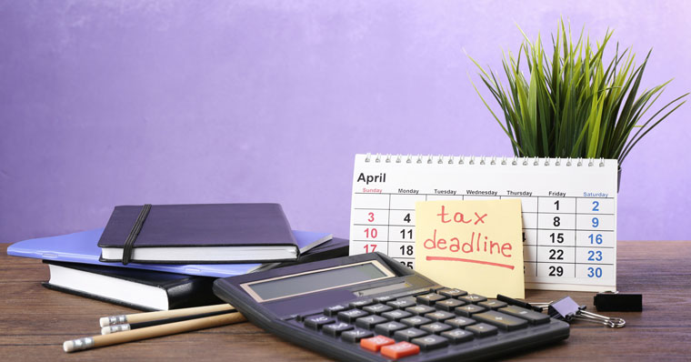 Tax deadline on desk with stationery