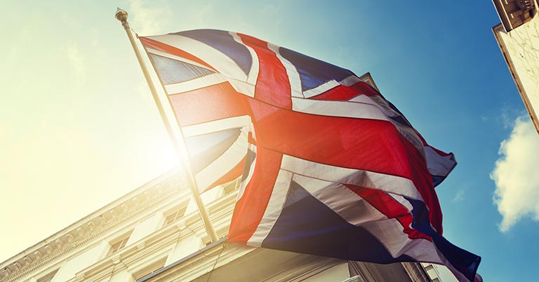 union-jack-uk-flag-sun-shine union jack flag on building